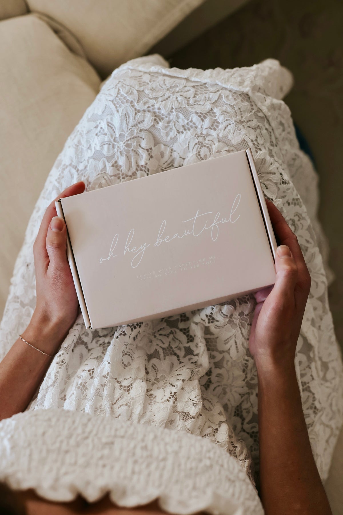 The Immaculate Blessed oh hey beautiful gift box held on a lace dress